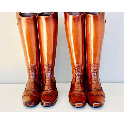 442 - STICK STANDS, a pair, 49cm H x 20cm W x 30cm D, in the form of riding boots (2)