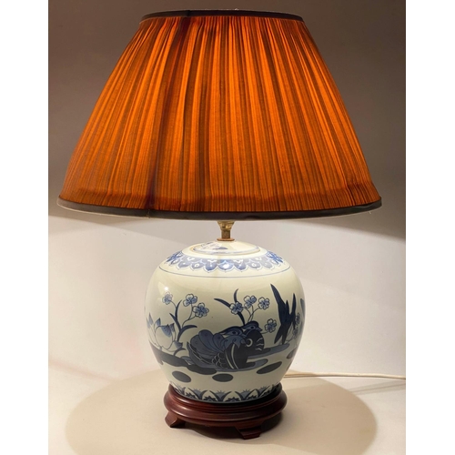 252 - TABLE LAMPS, 58cm H, a pair, Chinese blue and white ceramic of jar form with carved wooden bases and... 