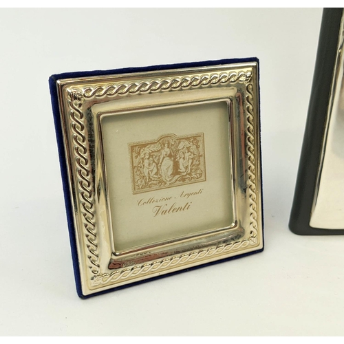 15 - A COLLECTION OF SILVERWARE, comprising Rococo embossed photo frame, three smaller photo frames, a ma... 