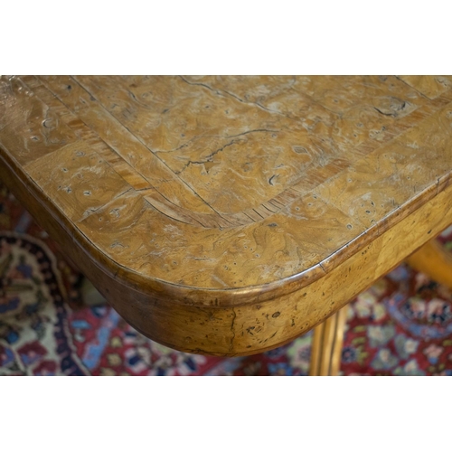 282 - DINING TABLE, Regency style, burr elm and elm with twin pedestals, two extra leaves, brass clips and... 