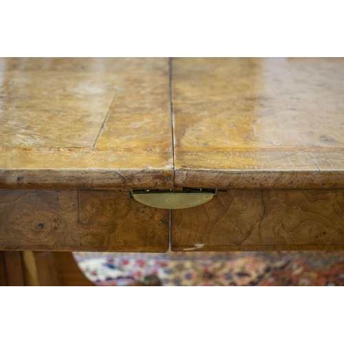 282 - DINING TABLE, Regency style, burr elm and elm with twin pedestals, two extra leaves, brass clips and... 