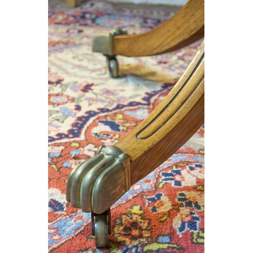 282 - DINING TABLE, Regency style, burr elm and elm with twin pedestals, two extra leaves, brass clips and... 