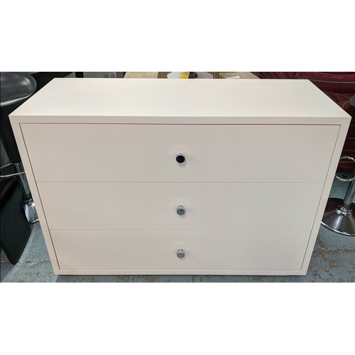 470 - CHEST OF DRAWERS, 125cm x 50cm x 87cm, white painted, three soft close drawers, polished metal handl... 