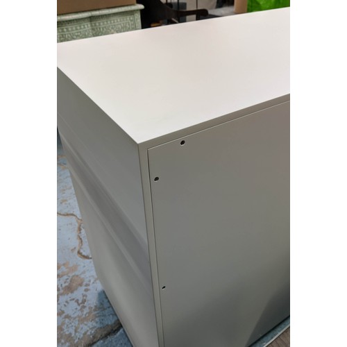 470 - CHEST OF DRAWERS, 125cm x 50cm x 87cm, white painted, three soft close drawers, polished metal handl... 