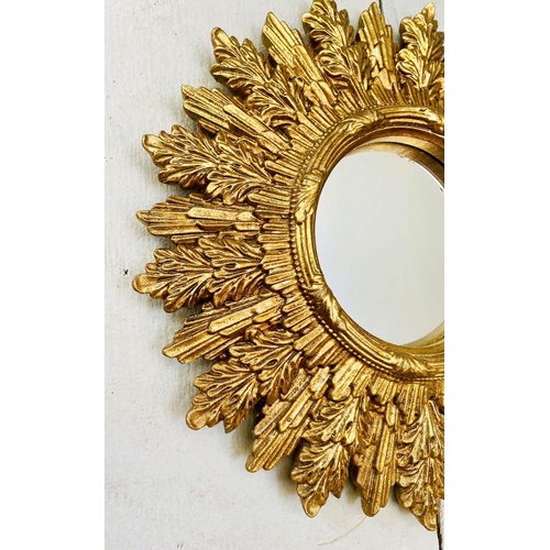 478 - CONVEX WALL MIRRORS, a set of nine, Regency style, gilt frames, various sizes. (9)