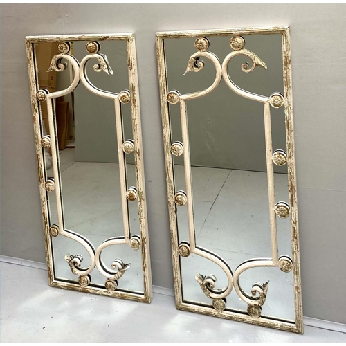 479 - ARCHITECTURAL WALL MIRRORS, a pair, Regency style, aged metal frames, 112cm x 48cm. (2)