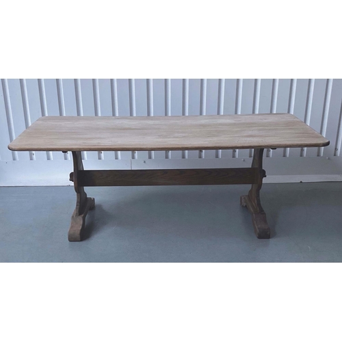 182 - REFECTORY DINING TABLE, round rectangular oak, planked and raised upon shaped trestle supports with ... 