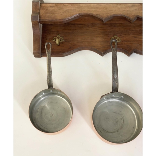 170 - BATTERIE DE CUISINE, copper pans, a set of five graduated pots and oak wall hanging rack, 26cm H x 1... 