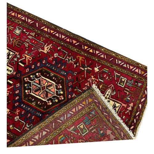 93 - PERSIAN HERIZ RUNNER, 390cm x 77cm.