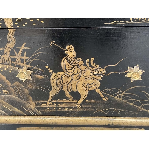 129 - CHEST, lacquered and gilded in the Chinese taste with three long drawers and stellar handles, 46cm x... 