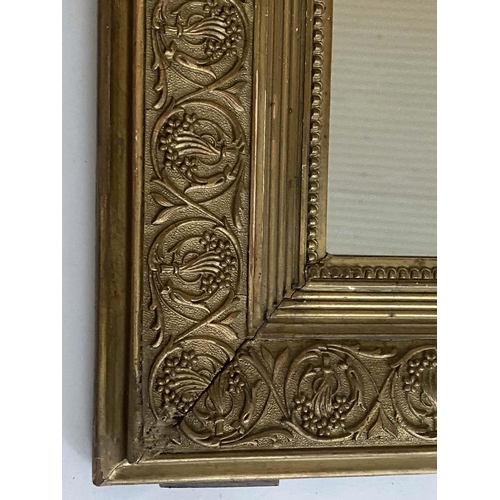 133 - OVERMANTEL MIRROR, late 19th/early 20th century French giltwood and gesso moulded with quiver and fl... 