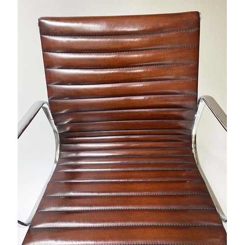 112 - REVOLVING DESK CHAIR, Charles and Ray Eames inspired with ribbed mid brown leather seat revolving an... 