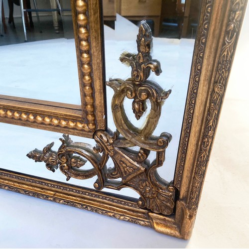 121 - WALL MIRROR, giltwood and gesso with bevelled and marginal plates and beaded frame, 183cm H x 92cm.