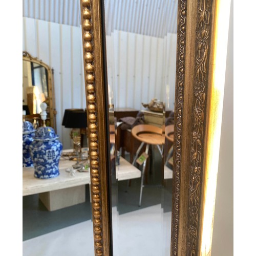 121 - WALL MIRROR, giltwood and gesso with bevelled and marginal plates and beaded frame, 183cm H x 92cm.