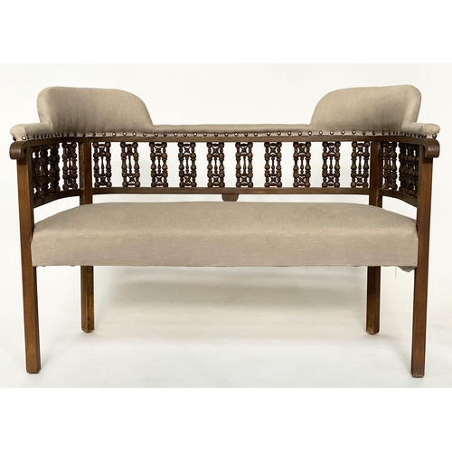 134 - HALL BENCH, late 19th century Moorish hardwood with enclosing raised back and studded linen upholste... 