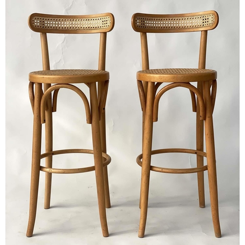 191 - BAR STOOLS, a pair, bentwood and cane panelled with raised bow backs, 95cm H, seat 71cm H. (2)