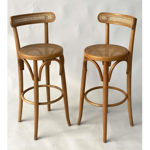 191 - BAR STOOLS, a pair, bentwood and cane panelled with raised bow backs, 95cm H, seat 71cm H. (2)