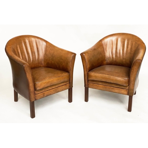 256 - TUB ARMCHAIRS, a pair, mid brown piped leather with slightly raised backs and cushion seats, 75cm W.... 