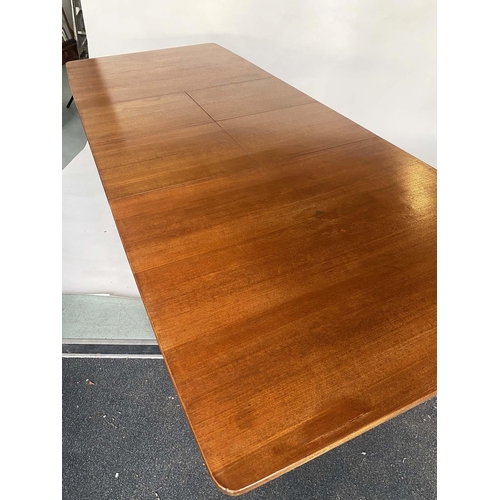 353 - MCINTOSH EXTENDING DINING TABLE, 1970's teak rounded rectangular with two integral foldout leaves la... 