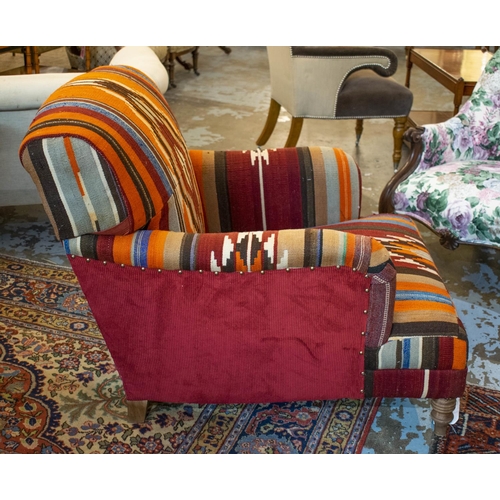 291 - ARMCHAIR, 77cm H x 83cm W, kilim and red corduroy upholstered.