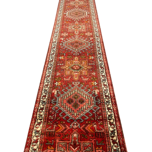 109 - PERSIAN KARAJA LONG RUNNER, 435cm x 70cm.