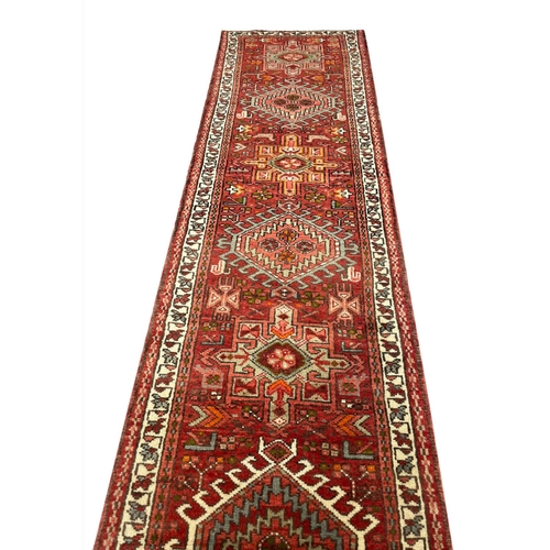 109 - PERSIAN KARAJA LONG RUNNER, 435cm x 70cm.