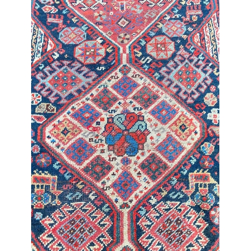 112 - ANTIQUE PERSIAN QASHQAI RUNNER, 482cm x 97cm.