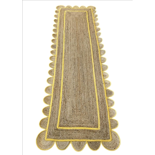 122 - SCALLOPED EDGE JUTE RUNNER, 315cm x 97cm.