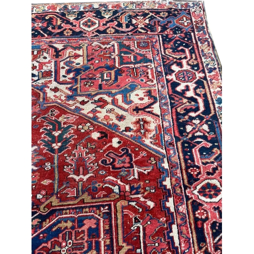 128 - ANTIQUE HERIZ CARPET, 350cm x 255cm.