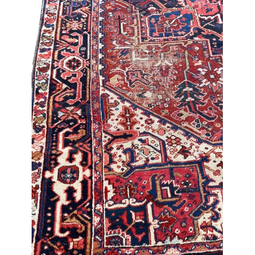 128 - ANTIQUE HERIZ CARPET, 350cm x 255cm.