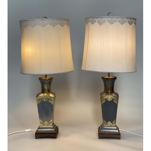 139 - TABLE LAMPS, a pair, pewter and pierced and engraved gilt metal mounted of vase form with bespoke li... 