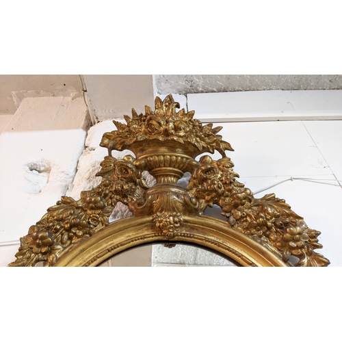 202 - PIER MIRROR, 183cm H x 73cm W, 19th century Continental giltwood and gesso with an elaborate surmoun... 