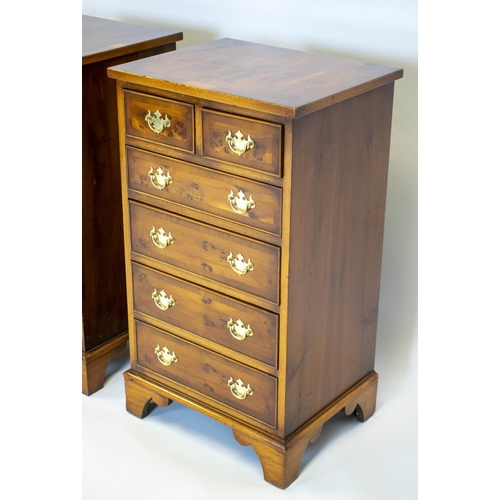 264 - BEDSIDE CHESTS, 83cm H x 47cm W x 48cm D, a pair, Georgian style yewwood, each containing six drawer... 