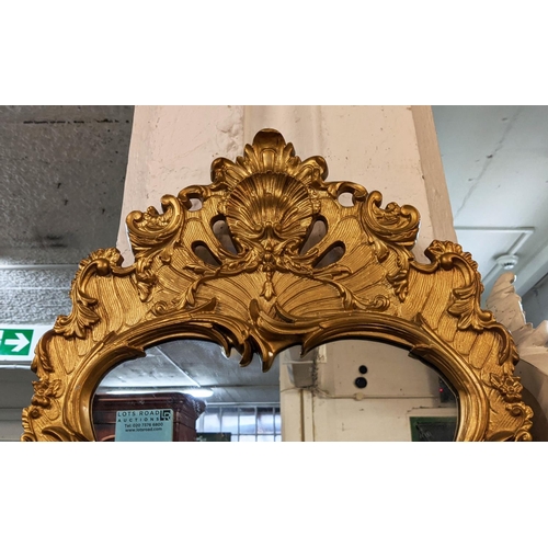 286 - GILT METAL WALL MIRROR, baroque style, 99cm H x 45cm W.