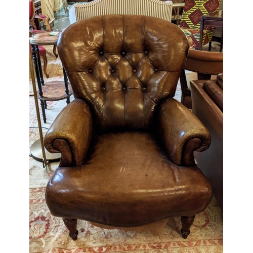 294 - CLUB ARMCHAIRS, a pair, brown leather buttoned backs, spring seats, raised on turned supports, tradi... 