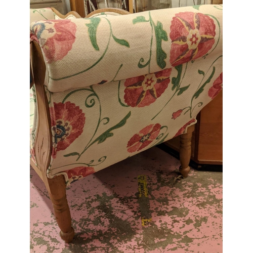 297 - SETTEE, late 19th century Continental ash in Colefax & Fowler style upholstery, raised on turned leg... 