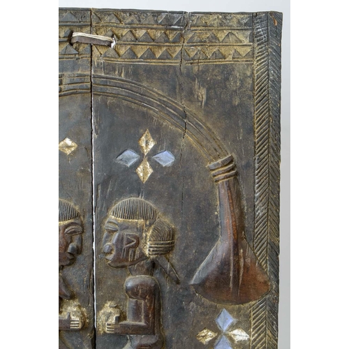 3 - AFRICAN TRIBAL DOOR, carved with opposing kneeling figures with feather edge and blue and white deta... 