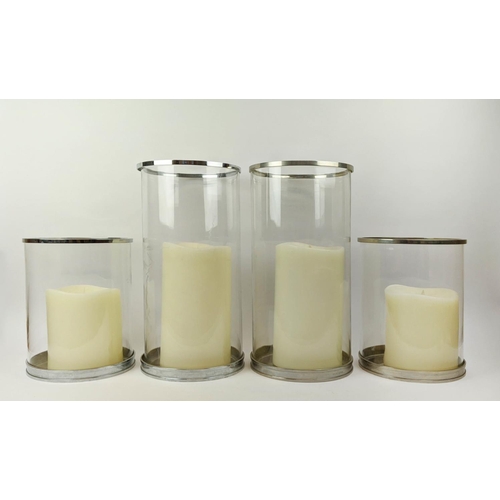 312 - RALPH LAUREN HOME HURRICANE LANTERNS, a set of four, with faux candles, 45.5cm H at largest. (4)