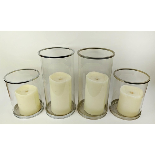 312 - RALPH LAUREN HOME HURRICANE LANTERNS, a set of four, with faux candles, 45.5cm H at largest. (4)