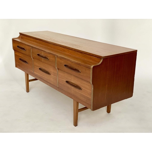 342 - LOW CHEST, 1970s teak with six short drawers and tapering supports, 150cm W x 50cm D x 70cm H.