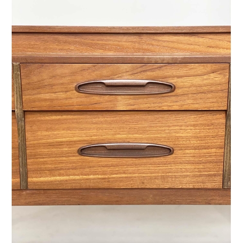 342 - LOW CHEST, 1970s teak with six short drawers and tapering supports, 150cm W x 50cm D x 70cm H.