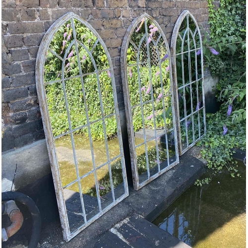 400 - ARCHITECTURAL GARDEN WALL MIRRORS, set of three, 160cm high, 67cm wide, Gothic arched metal frames. ... 