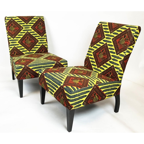 511 - LOUNGE CHAIRS, a pair, 90cm H x 66cm, in Batik fabric. (2)