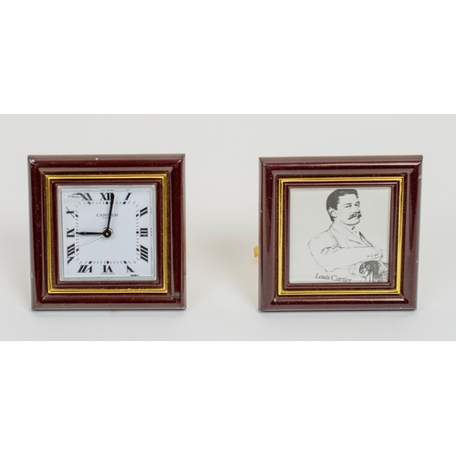 8 - CARTIER TRAVELLING CLOCK, AND PICTURE FRAME, Le Must 1970s in burgundy enamel. (2)
8cm x 8cm