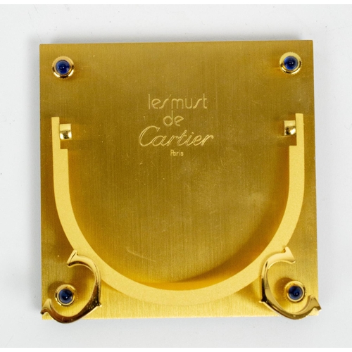 8 - CARTIER TRAVELLING CLOCK, AND PICTURE FRAME, Le Must 1970s in burgundy enamel. (2)
8cm x 8cm