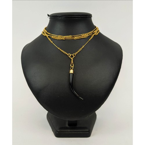 12 - AN 18CT GOLD ALBERT CHAIN, with a ebony tusk pendant, 142 cm / 56 inches long, total gold weight, 35... 