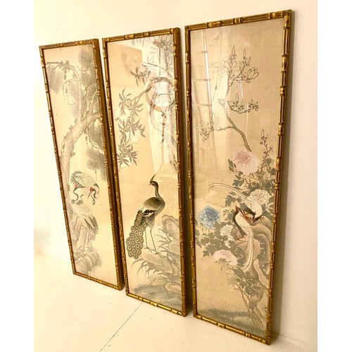 386 - CHINESE TRYPTYCH WALL PANELS, 170cm H x 48cm W, embroidered silk, faux bamboo frames. (3)