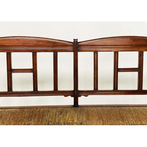 166 - HALL BENCH, late 19th century English walnut in the manner of Jas Shoolbred with raised back and rus... 