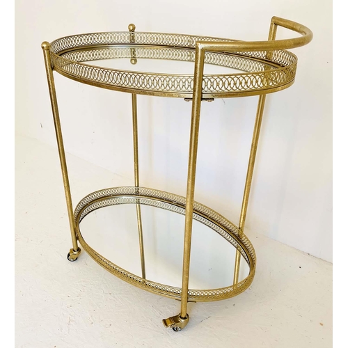 479 - COCKTAIL TROLLEY, 93cm high, 82cm wide, 37cm deep, Maison Jansen style, mirrored glass tiers, gilt m... 