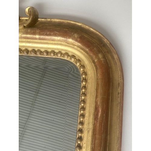 167 - OVERMANTEL MIRROR, 19th century French giltwood and gesso moulded with arched beaded frame and shell... 